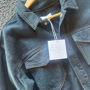 Pistola Jean dress with light brown stitching. Slit in front. New with tags.